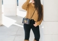 Louis Vuitton petite malle, black jeans, chunky sweater