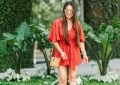 Summer essentials featured by top US fashion blog, LuxMommy: image of a woman wearing a Jack floral romper, Treasure & Bond wedge sandals, Antik Kraft straw bag, Quay Australia aviator sunglasses, Michele diamond watch, David Yurman bracelet, Argento Vivo necklace and Gorjana hoop earrings.