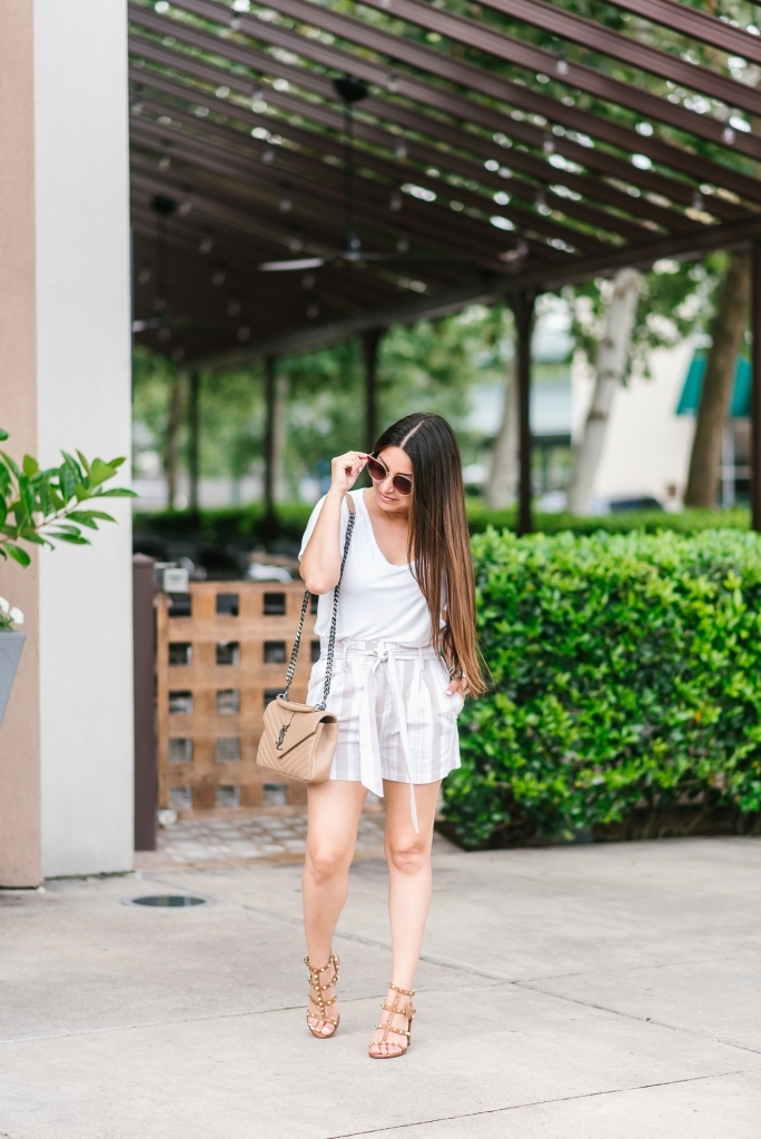 5 Reasons to love paperboy shorts featured by top US fashion blog, LuxMommy: image of a woman wearing American Eagle v neck tee, Socialite paperboy shorts, Valentino Garavani sandals, Gucci sunglasses, Argento two chocker, Michele watch, Kendra Scott charm bracelet, David Yurman bracelet, and an Yves Saint Laurent college matelasse.