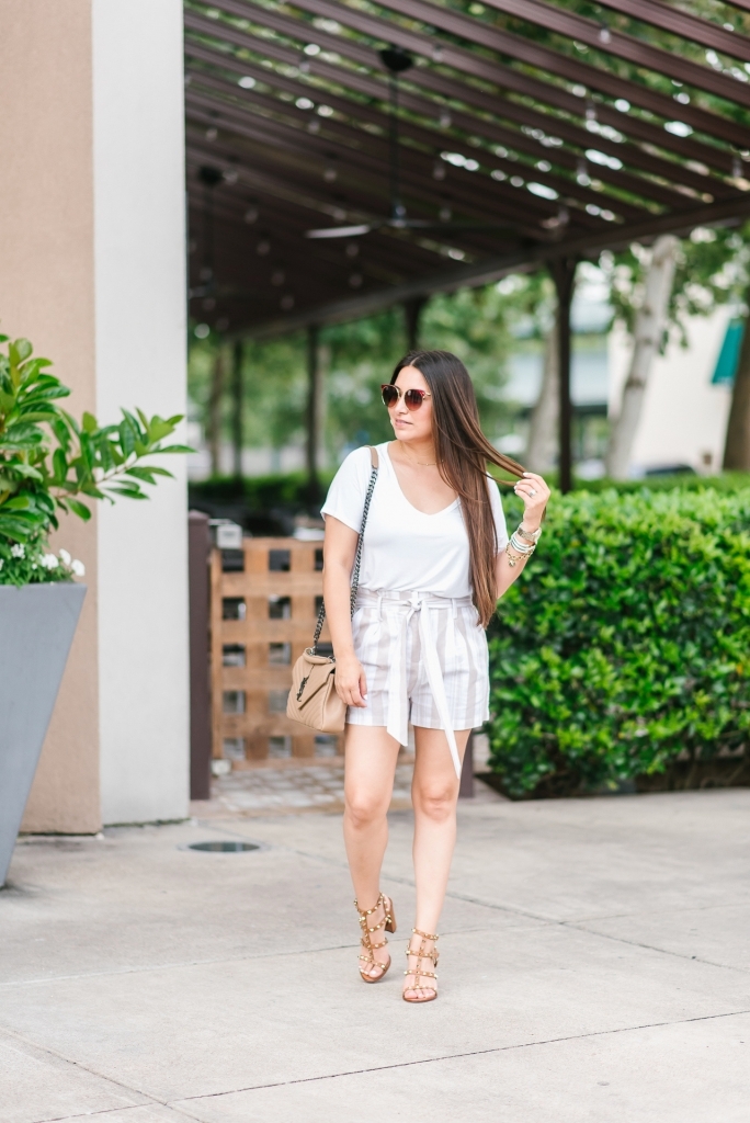 5 Reasons to love paperboy shorts featured by top US fashion blog, LuxMommy: image of a woman wearing American Eagle v neck tee, Socialite paperboy shorts, Valentino Garavani sandals, Gucci sunglasses, Argento two chocker, Michele watch, Kendra Scott charm bracelet, David Yurman bracelet, and an Yves Saint Laurent college matelasse.