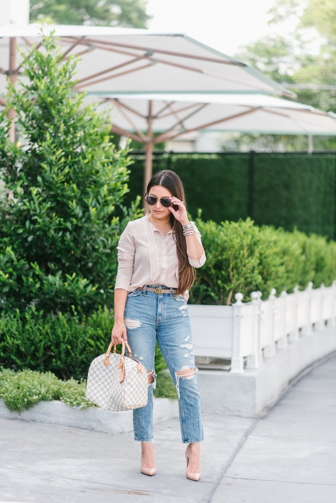 Distressed mom jeans styling tips shared by top US fashion blog, LuxMommy: image of a woman wearing a Petite Studio blush top, Abercrombie & Fitch distressed mom jeans, Christian Louboutin Pigalle pumps, Gucci Double GG belt buckle, Argento vivo choker, Quay Australia sunglasses, David Yurman bracelet, Michele diamond watch and Louis Vuitton Damier Azur