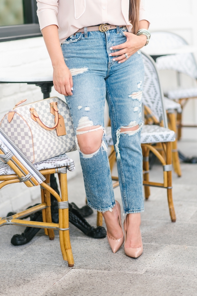 Distressed mom jeans styling tips shared by top US fashion blog, LuxMommy: image of a woman wearing a Petite Studio blush top, Abercrombie & Fitch distressed mom jeans, Christian Louboutin Pigalle pumps, Gucci Double GG belt buckle, Argento vivo choker, Quay Australia sunglasses, David Yurman bracelet, Michele diamond watch and Louis Vuitton Damier Azur