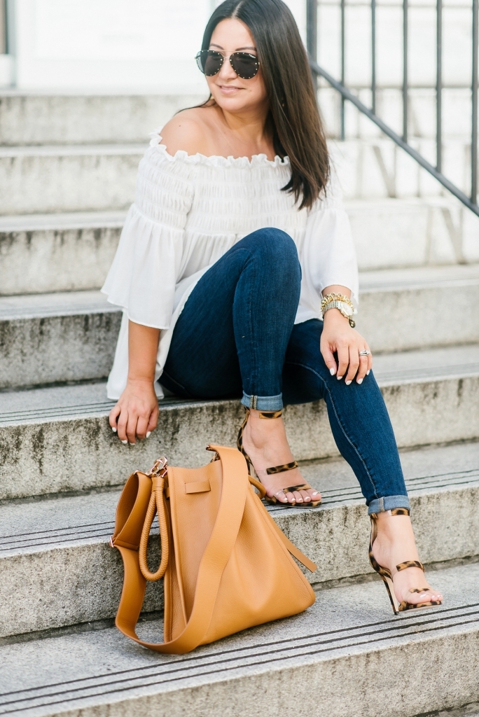 My New Tamara Mellon Handbag and Shoe Obsession by popular Texas fashion blog, Lux Mommy: image a woman sitting on stairs outside and wearing Tamara Mellon leopard print Frontline 105 shoes and a Tamara Mellon Kiss Bag.