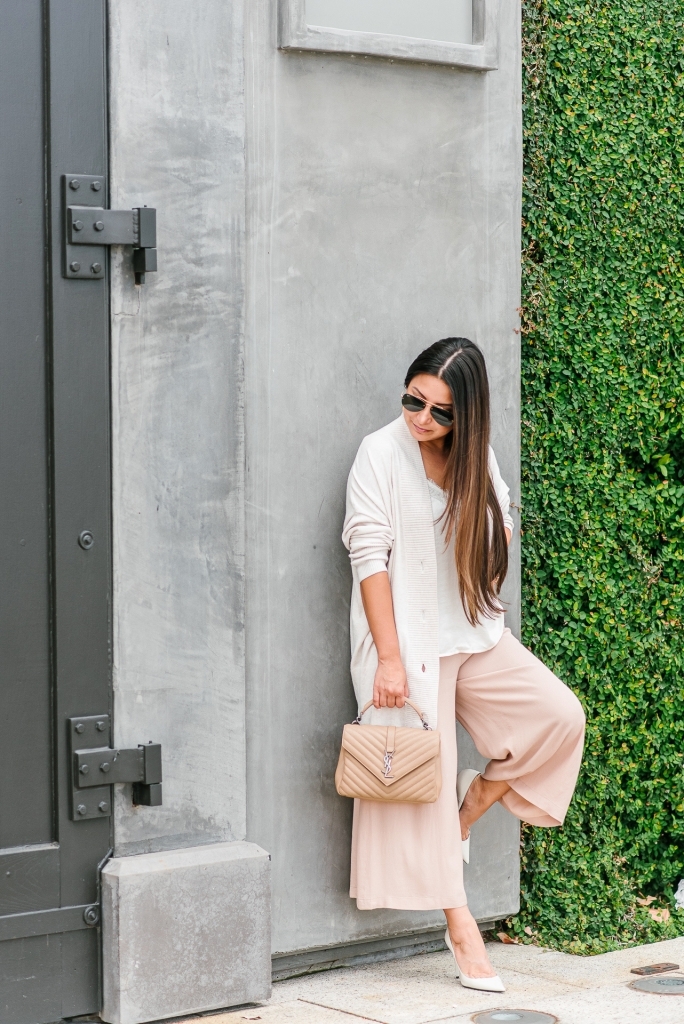 Oversized Cardigan Styled for the Office by popular fashion blog, Lux Mommy: image of woman standing outside wearing a Nordstrom Chelsea28 Oversize Button Front Cardigan, Nordstrom Leith Easy Crop Pants, Nordstrom Saint Laurent Zoe Pointy Toe Pump, Nordstrom Ray-Ban 61mm Gradient Lens Aviator Sunglasses, Argento Vivo Medium Hollow Hoop Earrings, Nordstrom Saint Laurent Medium College Quilted Leather Shoulder Bag, and Nordstrom BP Lace Trim Satin Camisole Top.