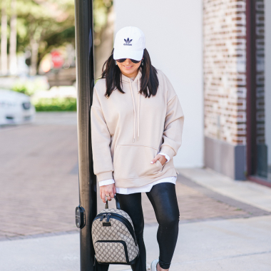 Houston top fashion blogger athletic style in an oversized hoodie, leggings and Gucci backpack