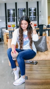 Nasa sweater, converse sneakers, goyard st louis handbag, wal-mart jeans